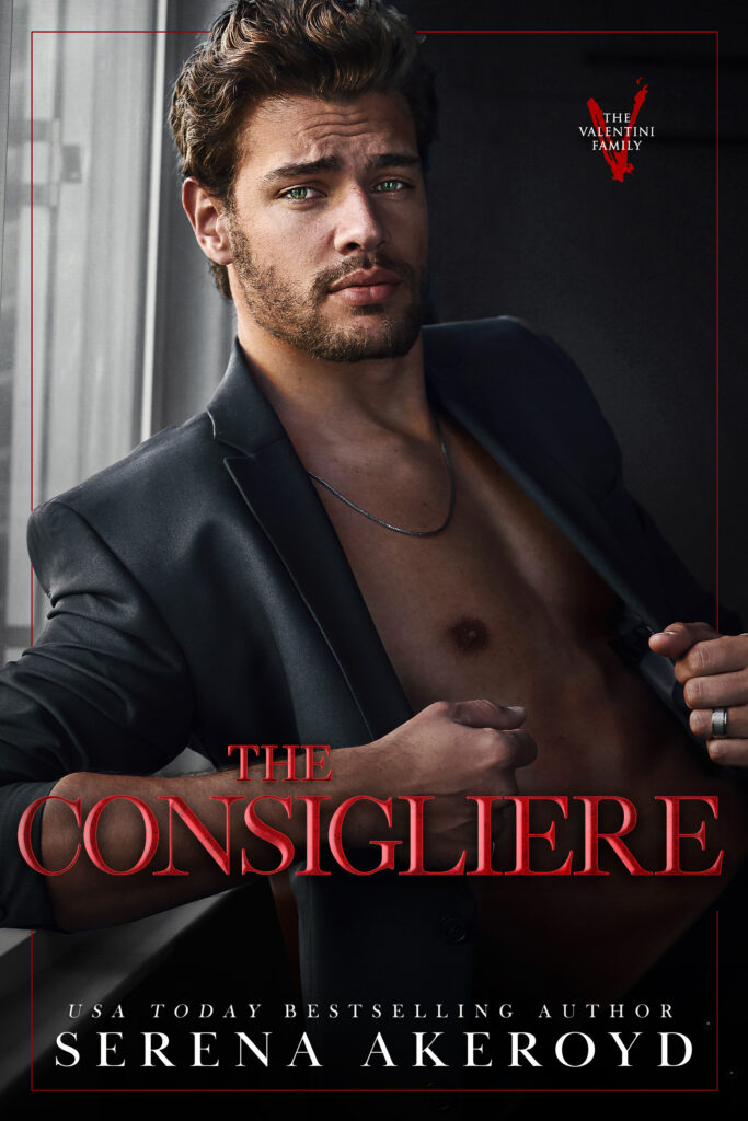 A handsome man in his 30s with dark brown hair and a tightly cropped beard wears a black suit jacket. The jacket is unbuttoned, showing the mans chest. He is sitting in a relaxed position, slightly leaning backwards in front of a window. Text reads: The Don - USA Today Bestselling Author Serena Akeroyd